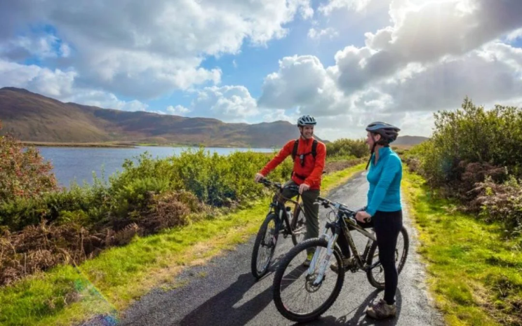 Two People on Bikes